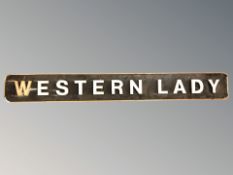A wood and composition sign 'Western Lady', length 164 cm.
