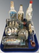 A group of vintage ships in bottles.