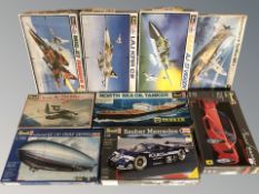 A box of model kits including Revell CONDITION REPORT: Contents un-checked.