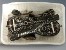 Various tortoiseshell and mother of pearl inlaid miniature musical instruments