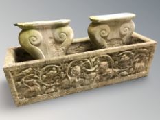 A concrete garden plant trough on stand, 31 cm W x 109 cm L.