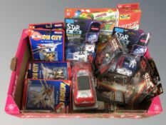 A box containing a group of Star Wars figures, Realtoy military aircraft all sealed in cases, etc.