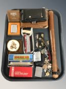A wooden truncheon, together with a Hohner harmonica, a Victorinox original Swiss army knife,