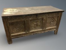 A 19th century oak carved blanket box, width 126 cm.