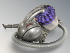 A Dyson DC39 vacuum.