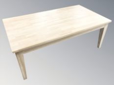 A Danish blonde oak rectangular coffee table, 135 cm x 75 cm x 53 cm.