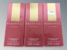 Three Estee Lauder Beautiful eau de parfum sprays, 75 ml, in cellophane wrapping.