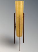 A 1970's rocket lamp on teak legs.