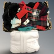 A group of clothing to include gloves, scarves, some with retail tags, dressing gown, etc.