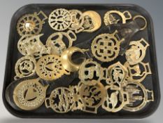 A group of horse brasses