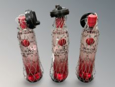 Three bottles of Ciroc red berry vodka.