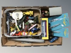 A box of die cast play worn vehicles, advertising items, plastic submarine,