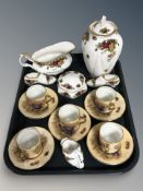 A group of Aynsley Orchard Gold coffee cans and Royal Albert Old Country Roses china