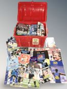 A box of late 20th century football programmes
