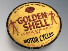 An enamel metal sign 'Golden Shell' diameter 30 cm