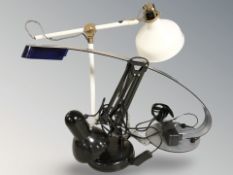 Three continental lights including an adjustable anglepoise lamp and a pendant light fitting.