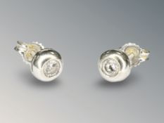 A pair of 18ct white gold diamond stud earrings, 1.8g.