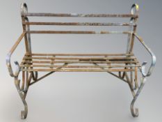A metal garden bench, 105.5 cm width.