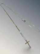 A 9ct white gold necklace with crucifix pendant set with diamonds CONDITION REPORT: