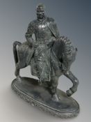 A resin figure of an oriental warrior on horseback,