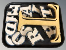 A group of 20th century plastic advertising letters including a large letter T.