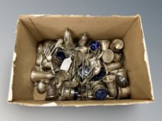 A quantity of silver plated cutlery, salt and pepper pots, etc.
