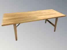 A contemporary Danish oak rectangular coffee table, 155 cm x 60 cm x 51 cm.