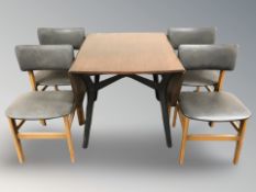 A mid century stained extending dining room table,