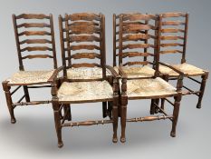 A set of six Titchmarsh & Goodwin oak rush seated ladder back chairs.