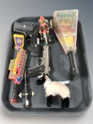 A group of tin plated gun, reproduction pistol,