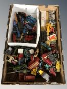 A box of die cast play worn vehicles,