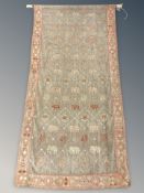 A far eastern embroidered wall hanging, 82 cm W x 176 cm H.