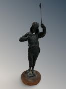 A spelter figure of a court jester,