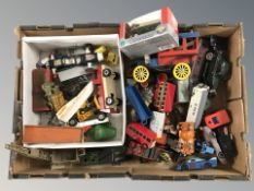 A box of die cast and other play worn vehicles,