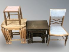 Two nests of hardwood tables, together with a stool and a child's chair.