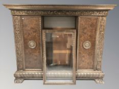 A continental burr walnut and stained beech triple door bookcase, height 186 cm.