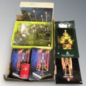 A box containing continental ornaments, candle holders, etc.