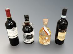 Four bottles of alcohol to include The Kraken black spiced rum 700ml, 2012 Moulin red wine,