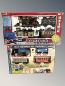 An electric locomotive child's train set, together with a Western Express electric train set.