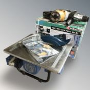 A tile cutter, an arc welder and a hammer drill.