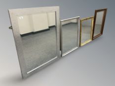A contemporary silvered mirror, 71.5 cm x 99 cm, together with three further contemporary mirrors.