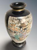 A 20th century Japanese satsuma earthenware vase, height 31 cm.