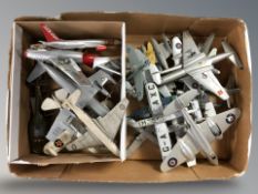 A quantity of die cast miniature scale aircraft.