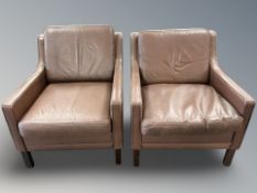 A pair of late 20th century Danish brown leather armchairs,