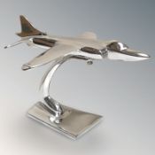 An aluminium figure of a harrier jet, length 29 cm.