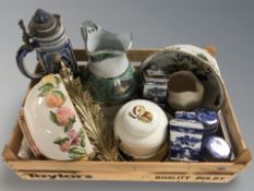 A German pottery stein, Ringtons caddies, two brass floral wall brackets,