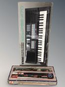 A Lima train set and a Yamaha PSF-470 electronic keyboard in box