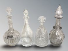 Four various crystal decanters,