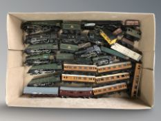 A quantity of die cast locomotives, carriages and other rolling stock.