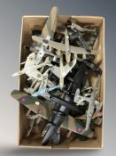 A quantity of die cast miniature scale aircraft.
